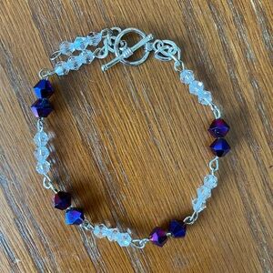 Purple and clear crystal beaded bracelet